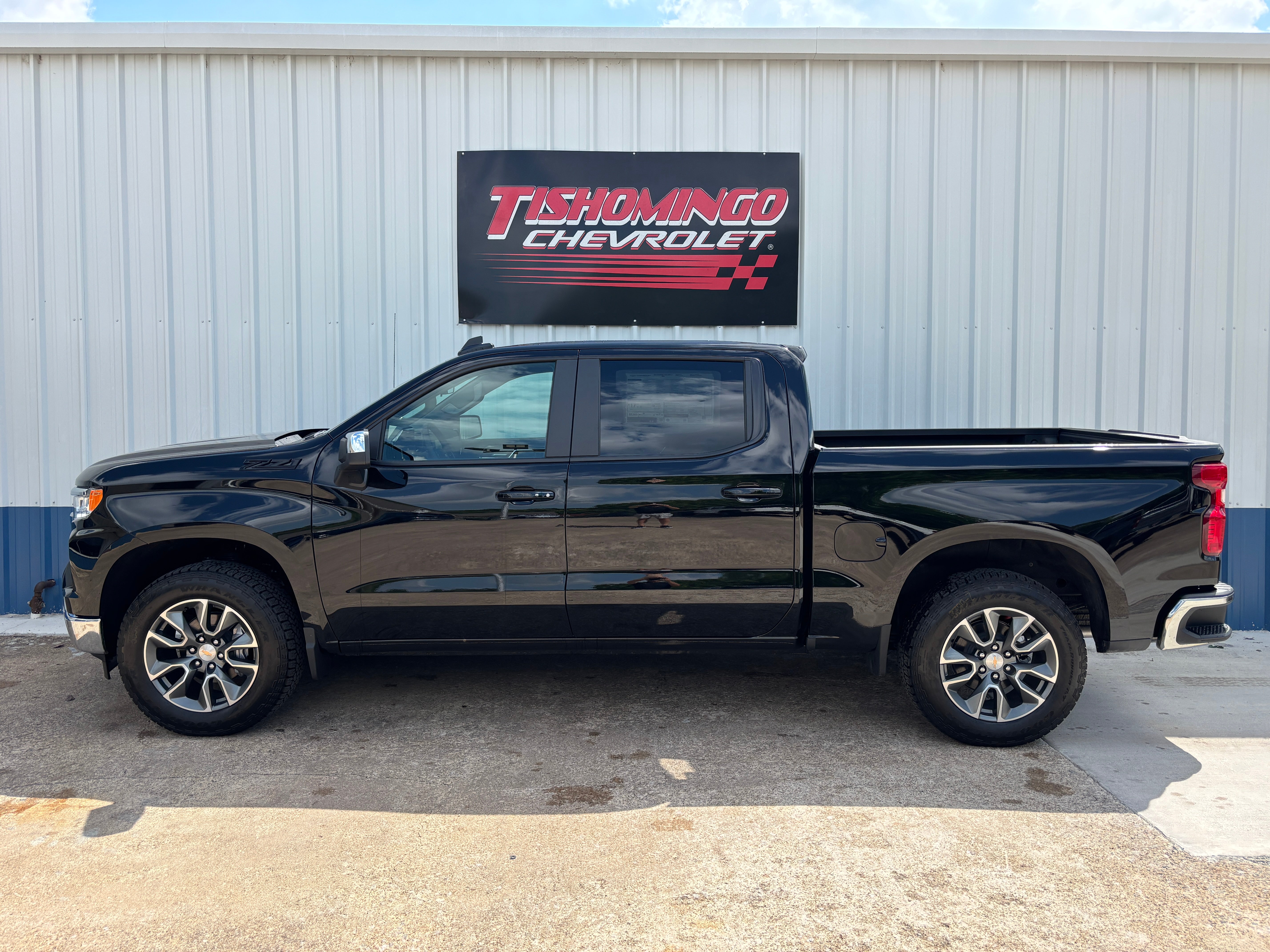 2026 Chevrolet Silverado 1500 LT in Black — front three-quarter view